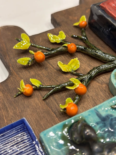 Ceramic orange tree with its branches, leaves and fruit